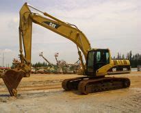 Used Excavators for sale in Bangkok, Thailand. Caterpillar 